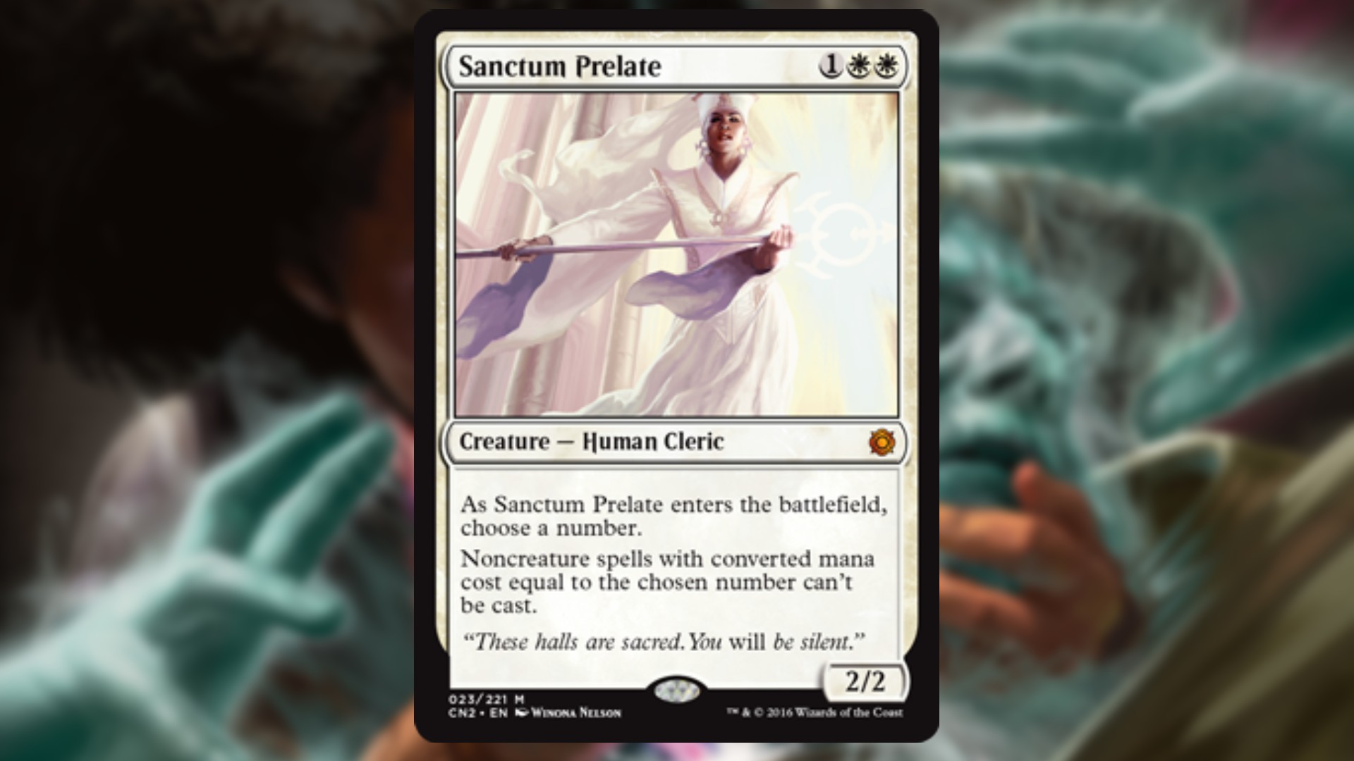 magic the gathering card in white with art depicting a human cleric in white robes holding a horizontal white staff