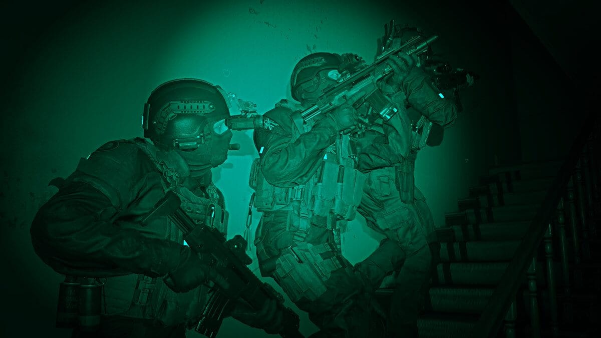 Gameplay screenshot of Modern Warfare (2019), showcasing night vision goggles watching men go up stairs in the dark.