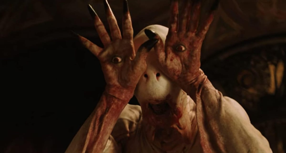 The "Pale Man" of Pan's Labyrinth shows its unsettling stare.