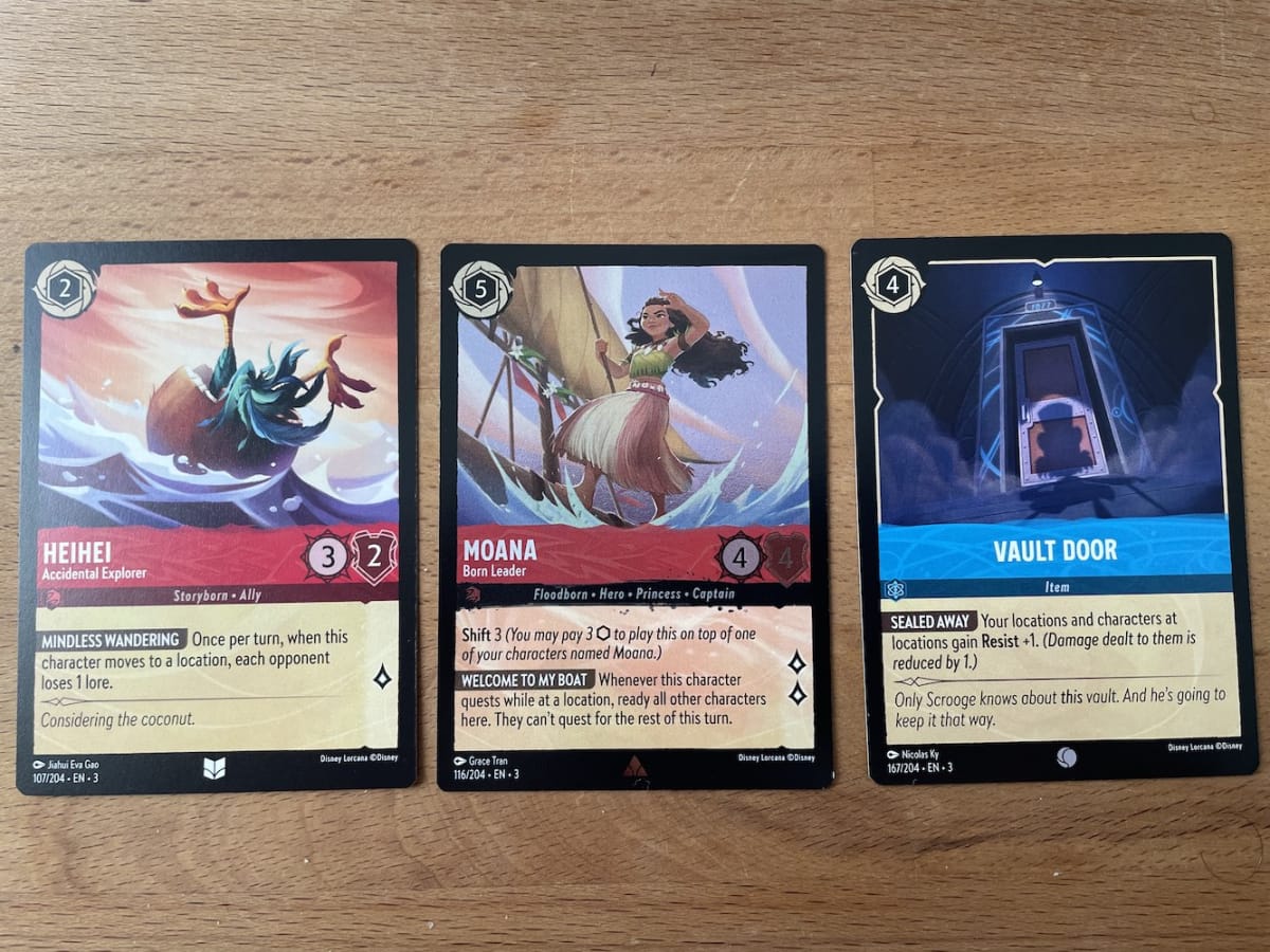 An image from our Disney Lorcana Into The Inklands Starter Deck Review showing off cards that combo off of Location cards