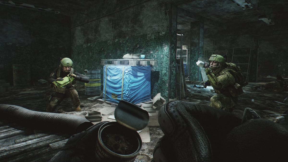 Soldiers sitting around in a group eating and drinking in a dilapidated building in Escape from Tarkov