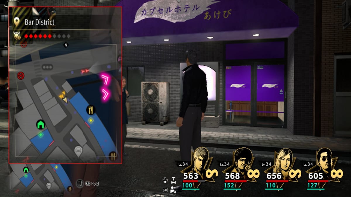 like a dragon infinite wealth screenshot showing a map reference and a giant purple awning over a business
