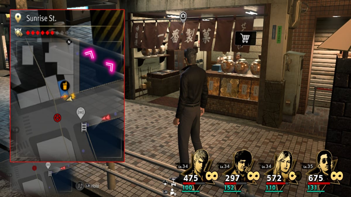 like a dragon infinite wealth screenshot showing a map reference and a sweet shop with an open front