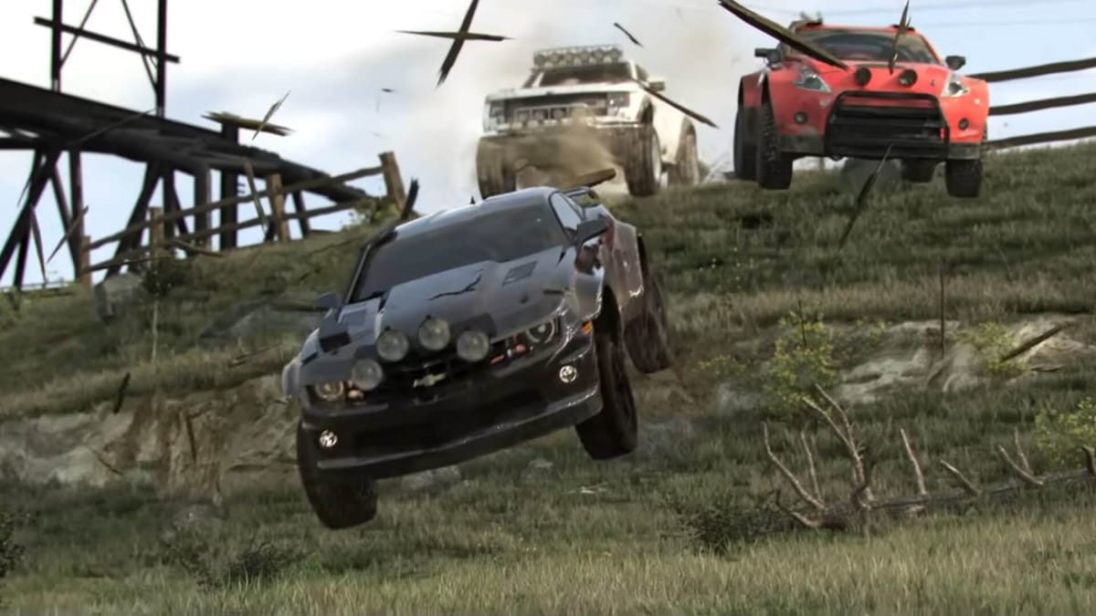 Cars breaking a barrier and going off-road in The Crew, a game shown off at the Ubisoft E3 2013 presentation
