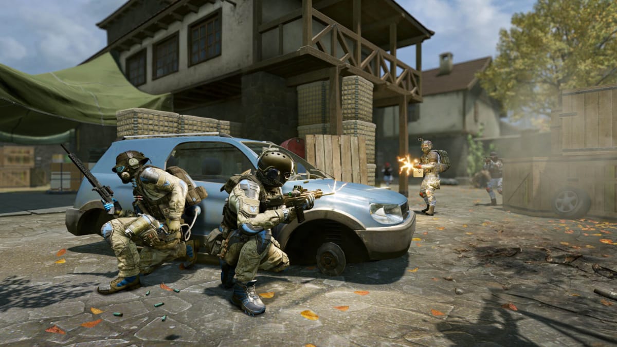 A group of soldiers crouching behind a car while enemy soldiers fire at them in Warface
