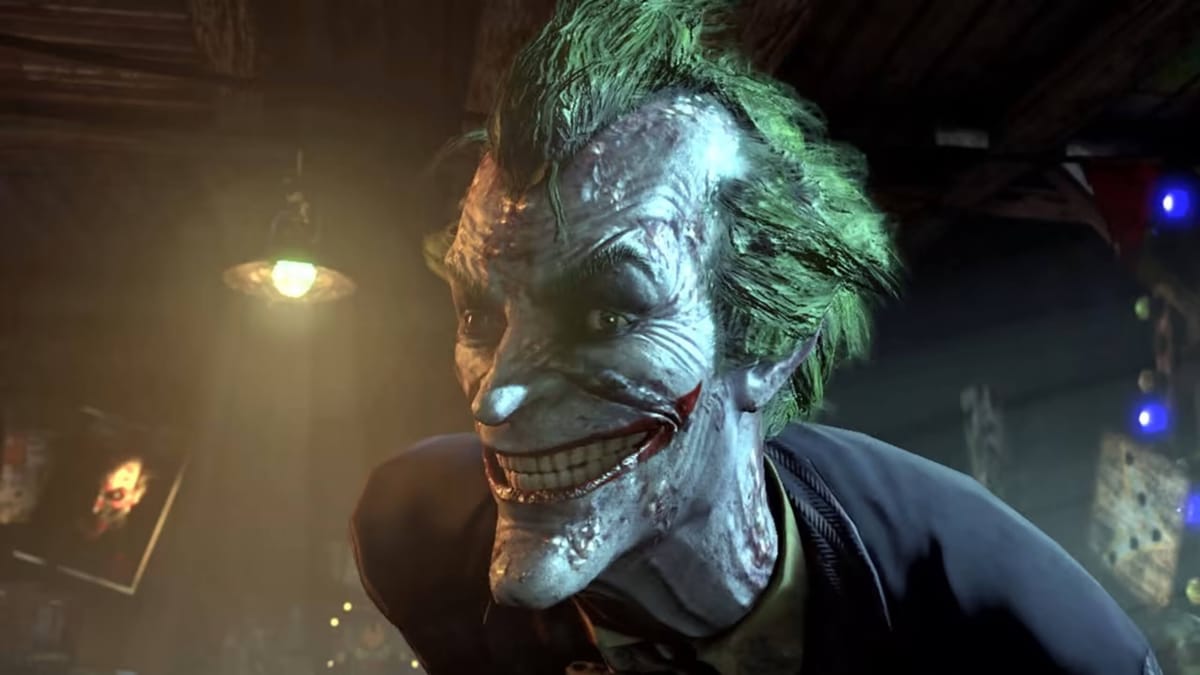 The Joker grinning at the camera in Batman: Arkham Trilogy