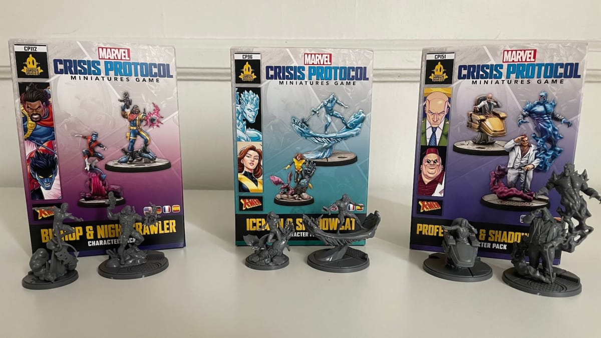 An image from Marvel Crisis Protocol depicting the minis for Professor X Shadow King Bishop Nightcrawler Iceman and Shadow Cat