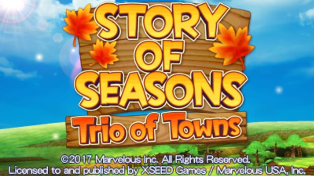 artwork showing a natural landscape of a green meadow with bright blue sky above. In the centre, a wooden board decorated with autumn leaves surrounds writing that says "Story of Seasons: Trio of Towns"