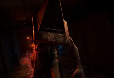 Silent Hill's Pyramid Head lurching through a dark corridor