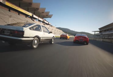 Three cars racing in Gran Turismo 7