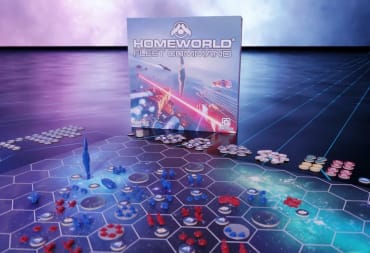 An image of the box art and game pieces of Homeworld Fleet Command