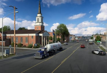 A truck driving down the road in an Oklahoma city in American Truck Simulator