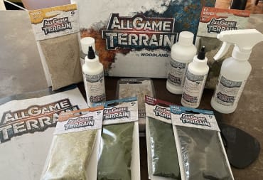 An image of a variety of All Game Terrain products laid out on a table, the header image to our All Game Terrain Review.