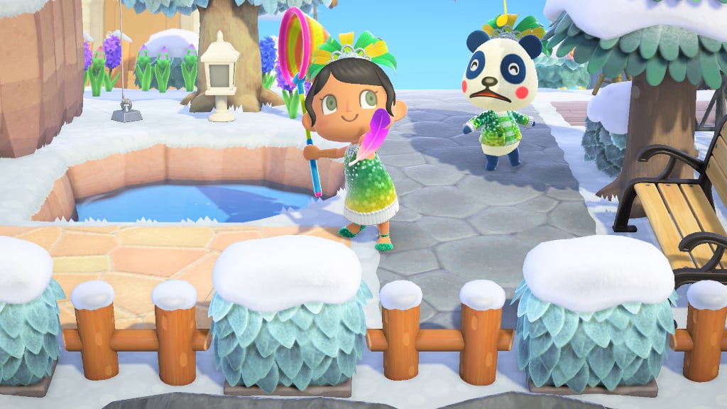 A villager holding a colored feather in the Animal Crossing: New Horizons Festivale update