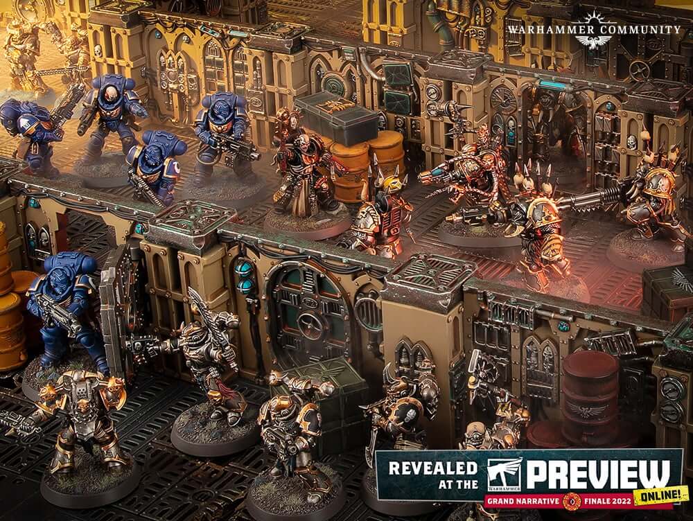 The Ultramarines face off against some Black Legion warriors in a Warhammer 40K boarding action game.