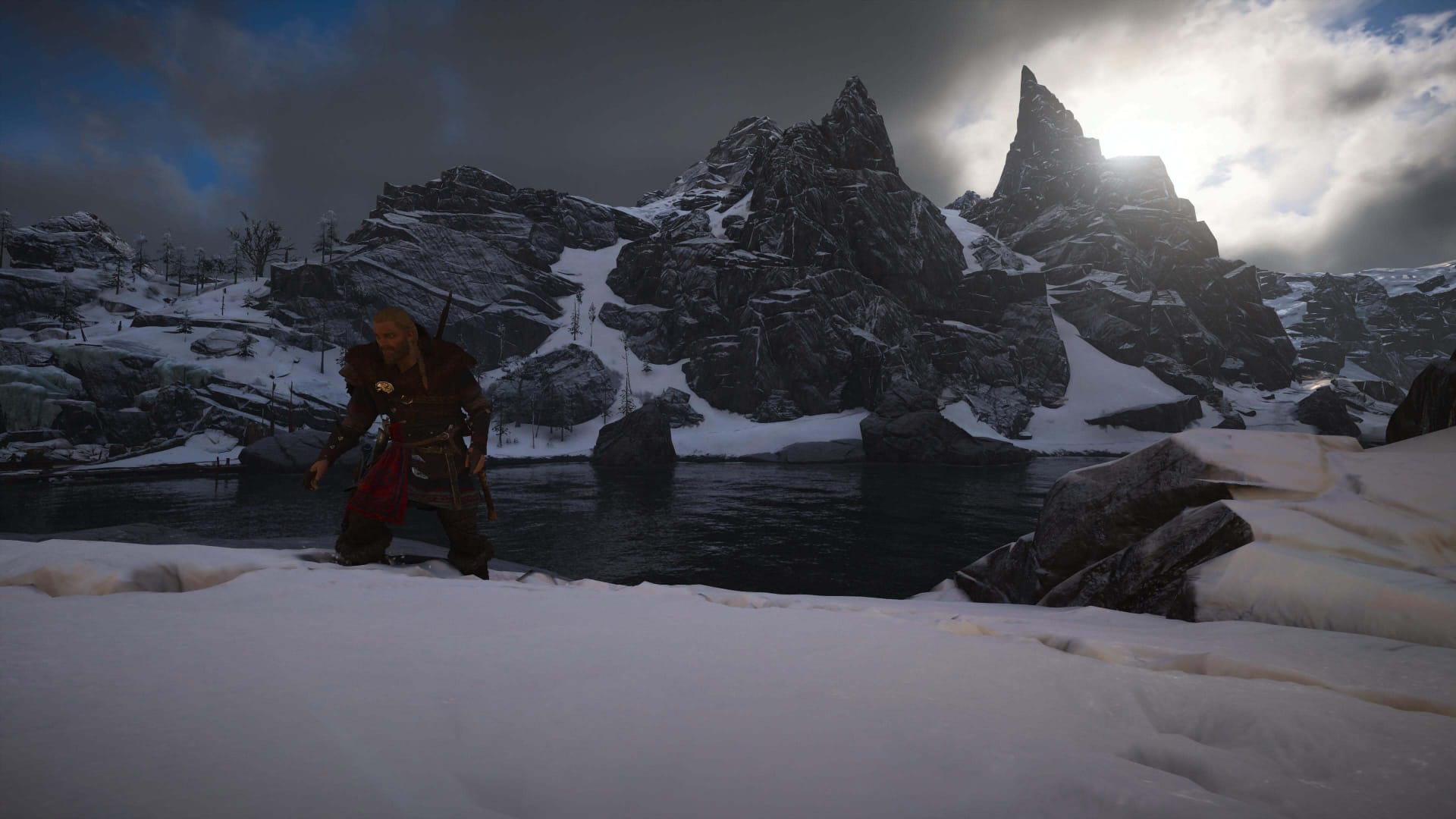 On the side of a snowy lake in Assassin's Creed: Valhalla 