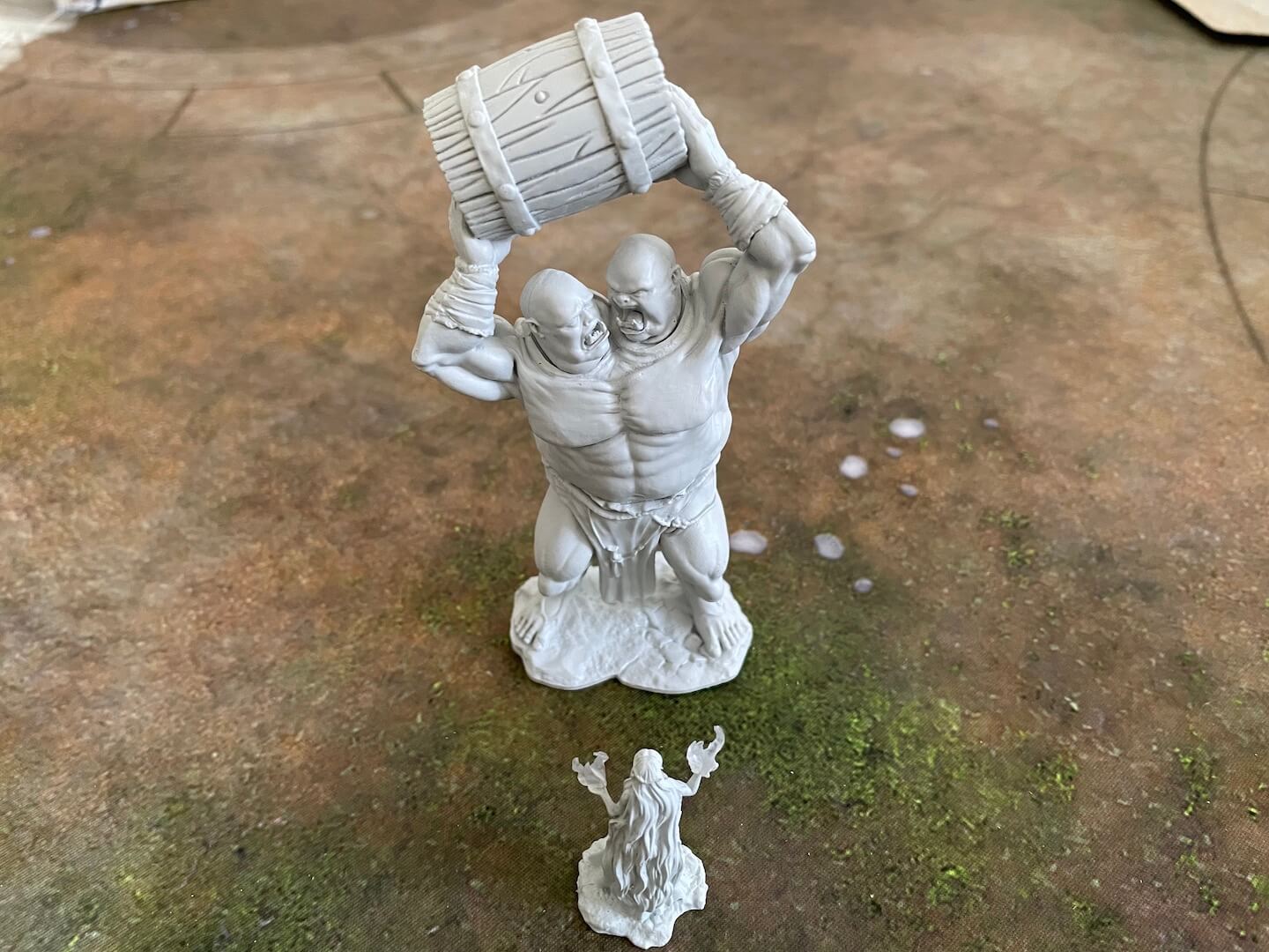 The two-headed Etten argues with itself as it attempts to smash its foe, as part of Wave 2 of Wizkids' Critical Role unpainted miniature line
