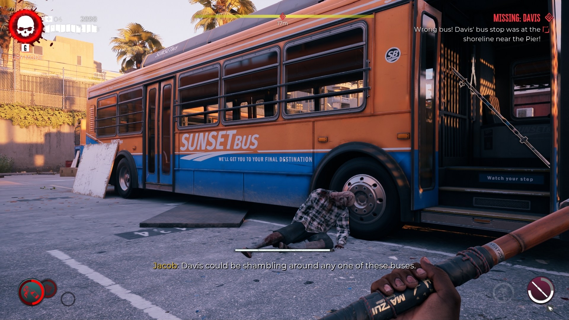 Dead Island 2 screenshot showing a corpse propped up against a bus in a large compound filled with other buses. 