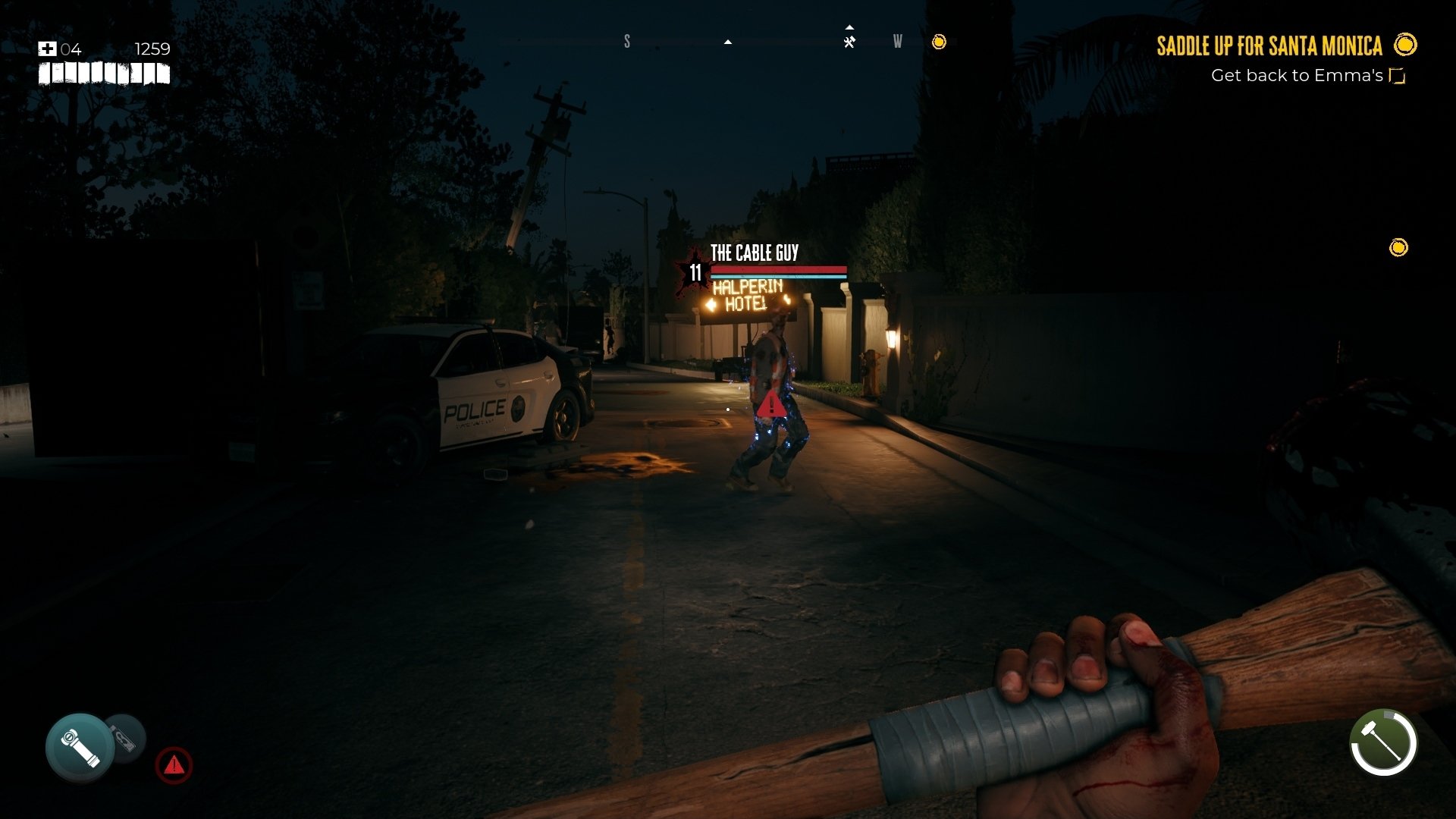 Dead Island 2 Screenshot depicting a lone zombie wandering around dark Bel Air streets at night