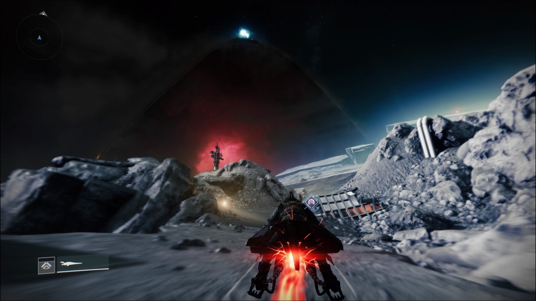 A Warlock riding across the moon on a Sparrow, a giant planet-eating ship is seen on the horizon