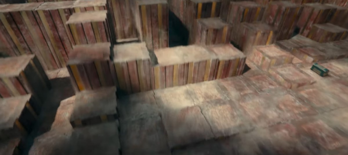 A moving shifting maze made out large stone square columns