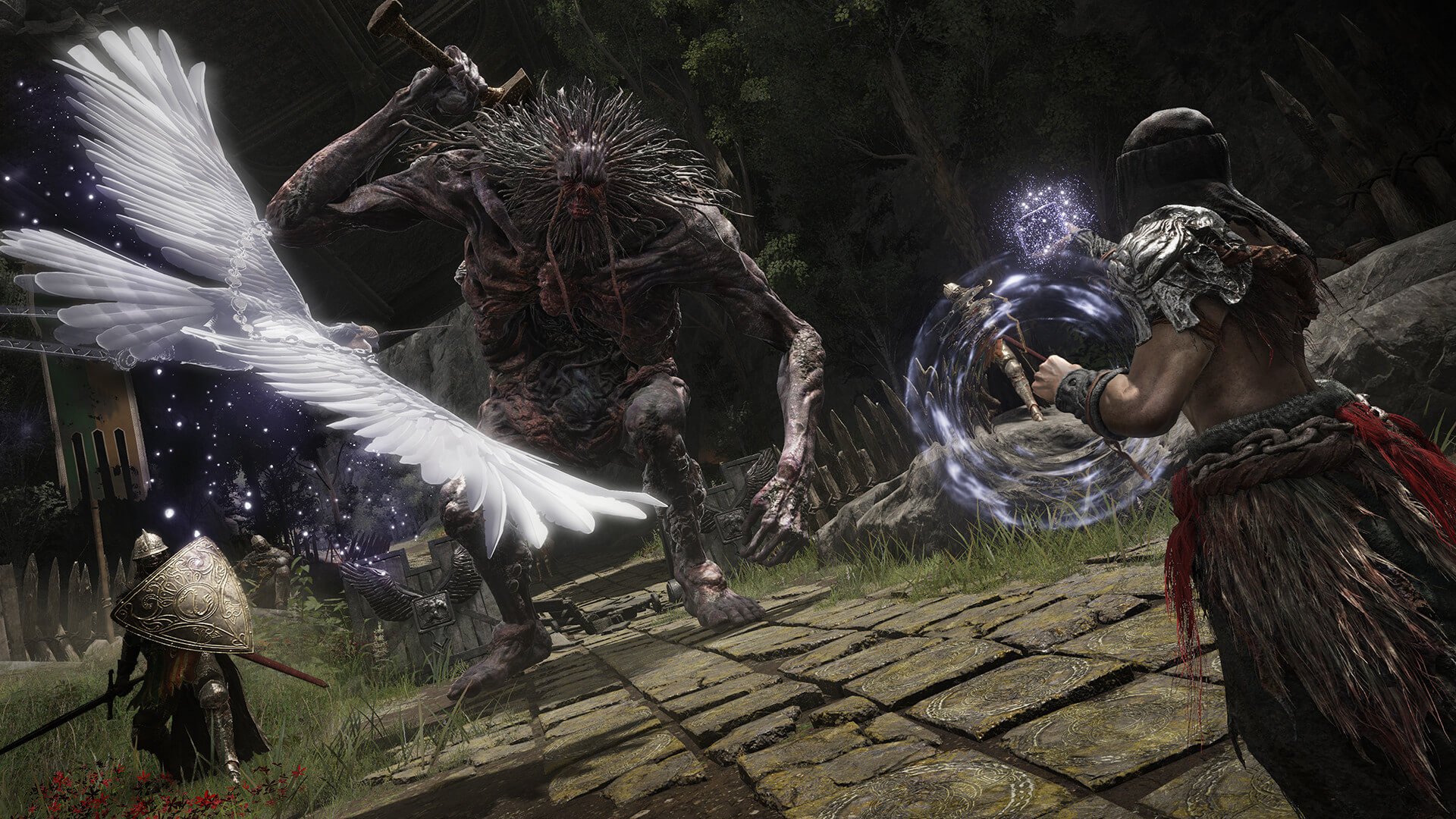 The player battling a giant enemy with spirit ashes in Elden Ring