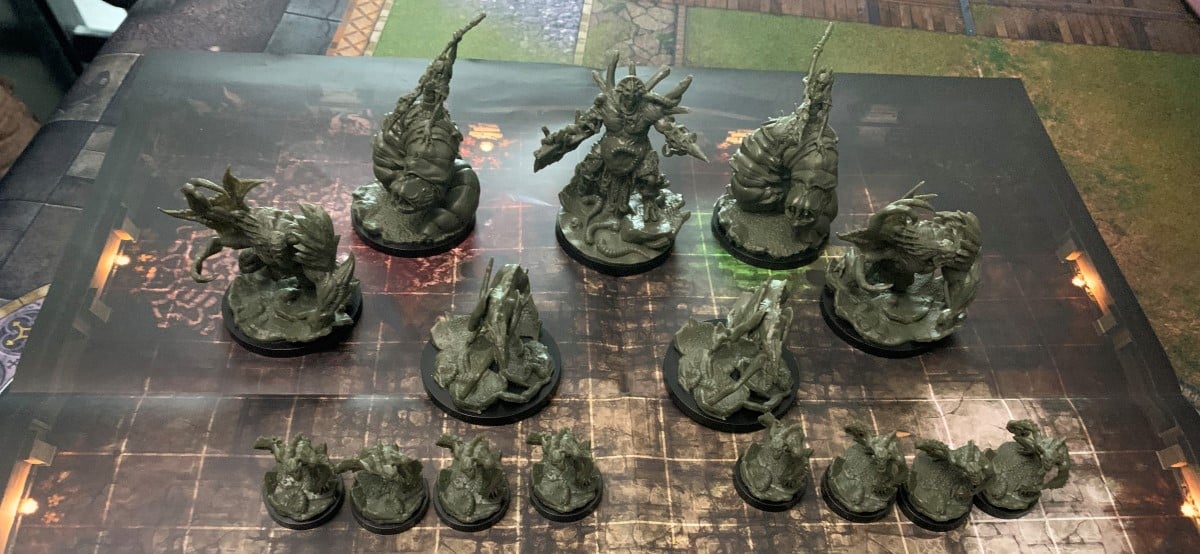 A collection of Ghoul-kin miniatures on a battlemap