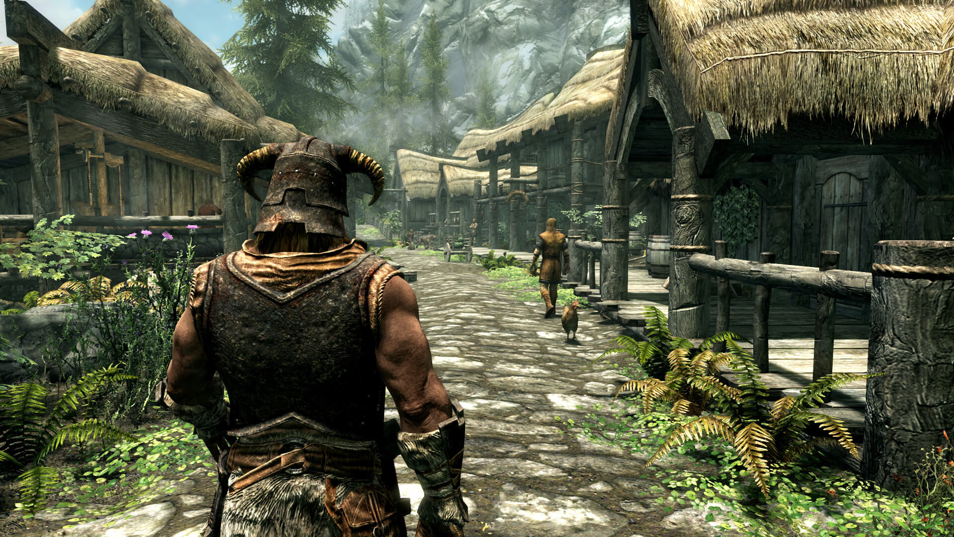 The Dragonborn walking through a village in Skyrim, one of GOG's biggest games in 2022