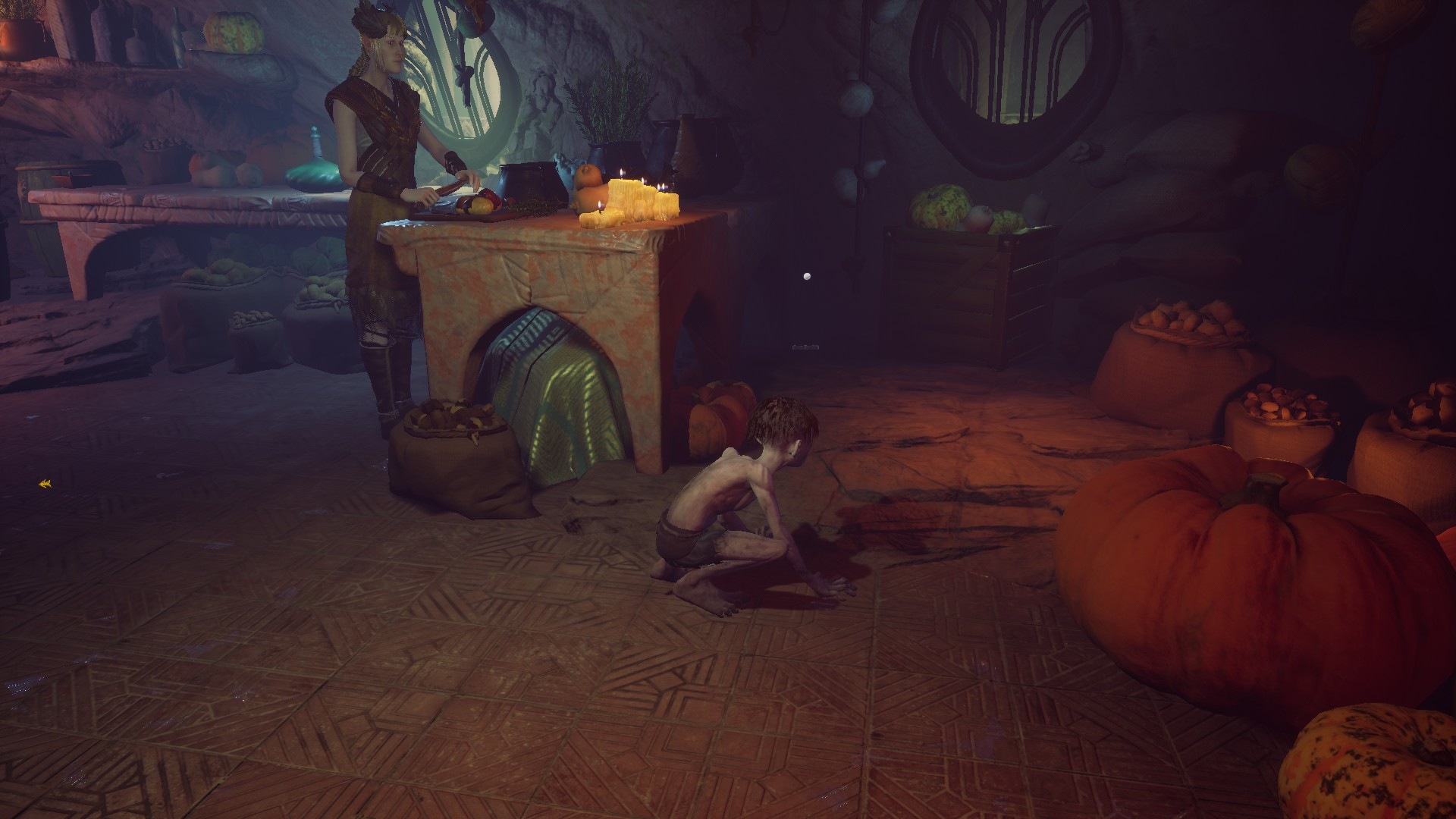 Gollum screenshot showing an elf cooking while Gollum crouches behind the counter. 