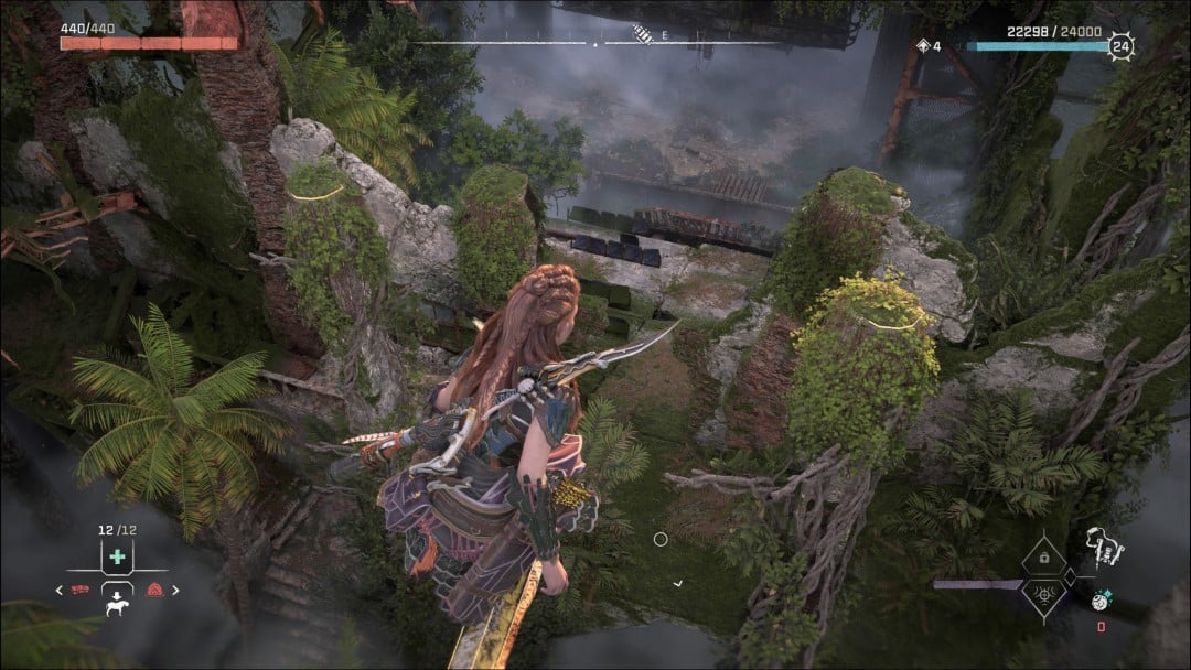 Aloy overlooking some ruins, staring at a rusted ramp down below