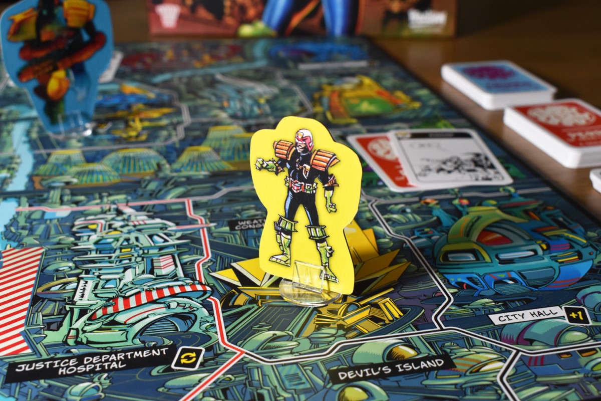 Promotional image of the board and Cadet game piece from the Judge Dredd board game