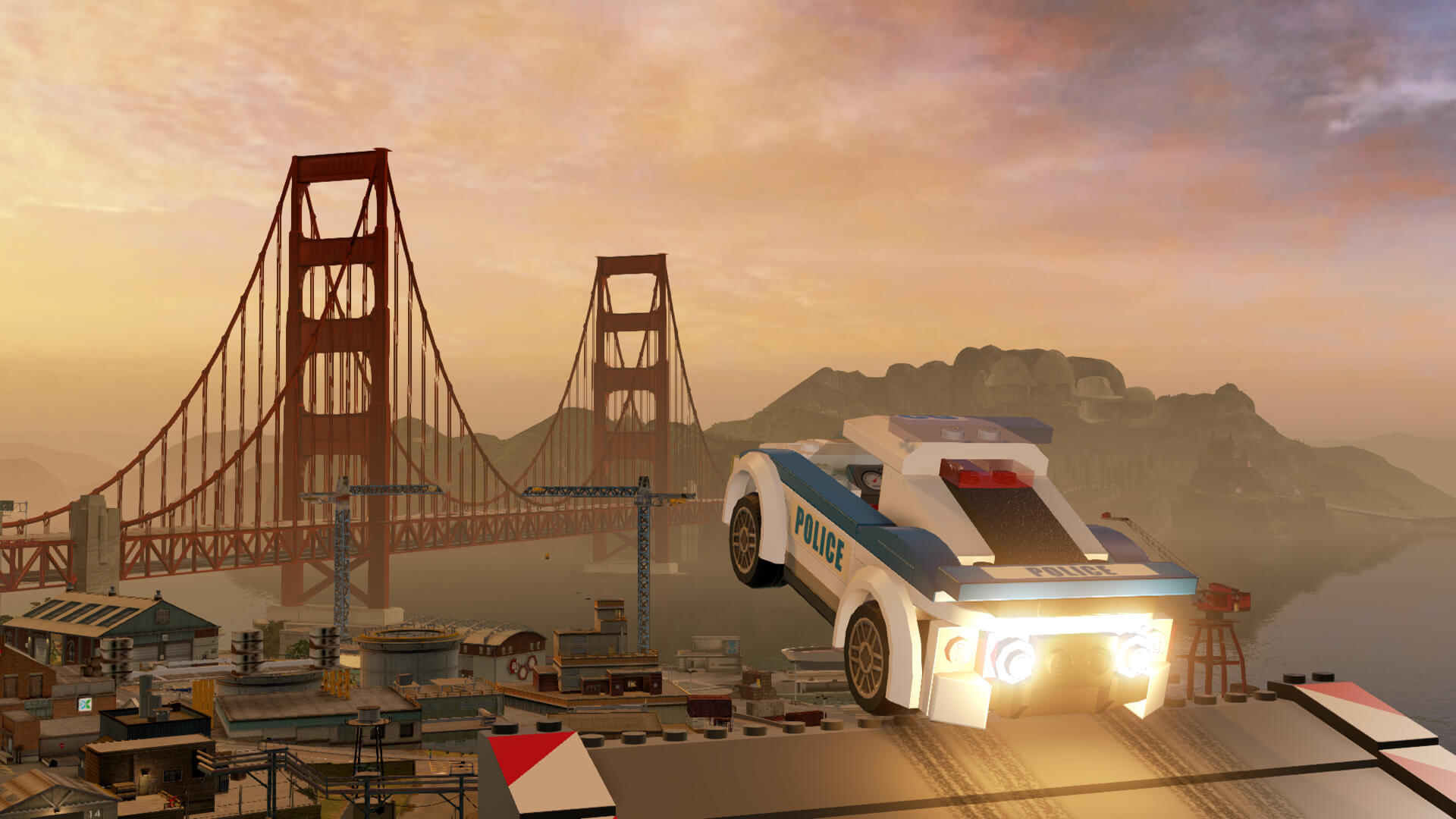 Chase McCain driving a police car in Lego City Undercover, likely one of the inspirations behind Lego 2K Drive