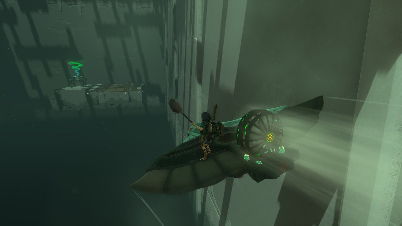 Link riding a flying machine powered by wind through a shrine in Tears of the Kingdom