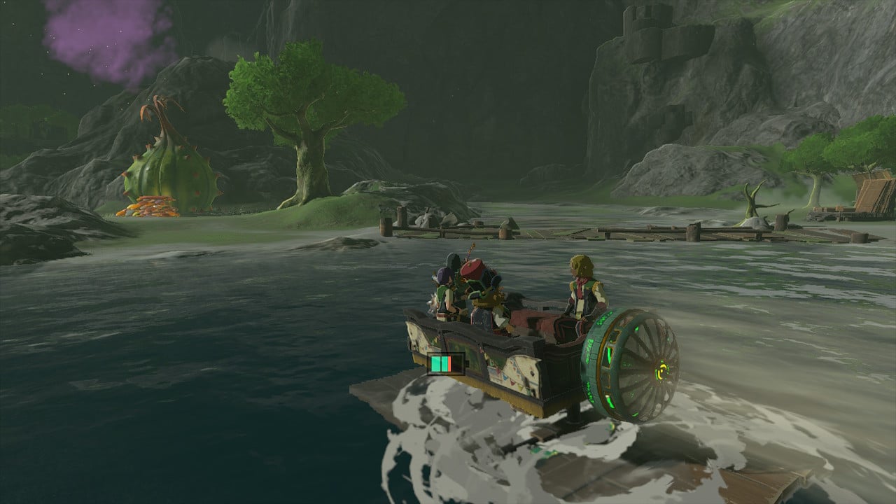 Link on a homemade ferry boat crossing a river in Tears of the Kingdom