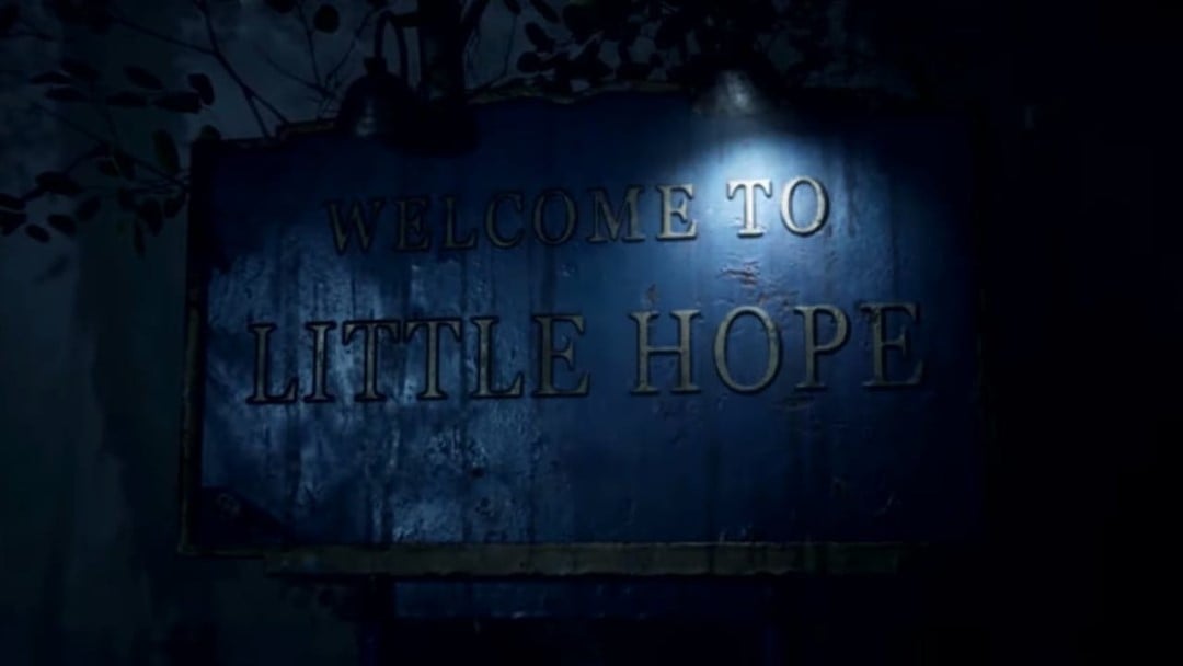 The sign of Little Hope, rusted and decayed