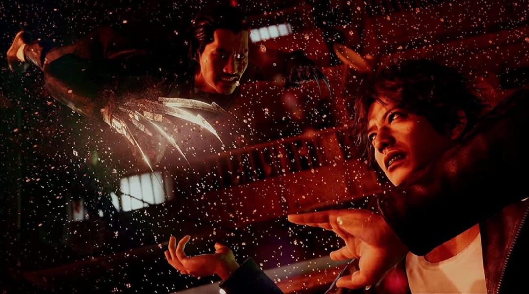 Yagami fighting a man with a metal claw in a rainstorm