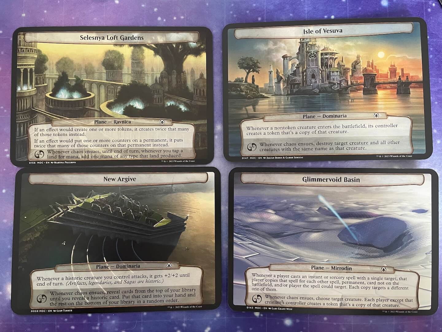 An image of some planechase cards included in Magic: The Gathering March of the Machine Commander Deck