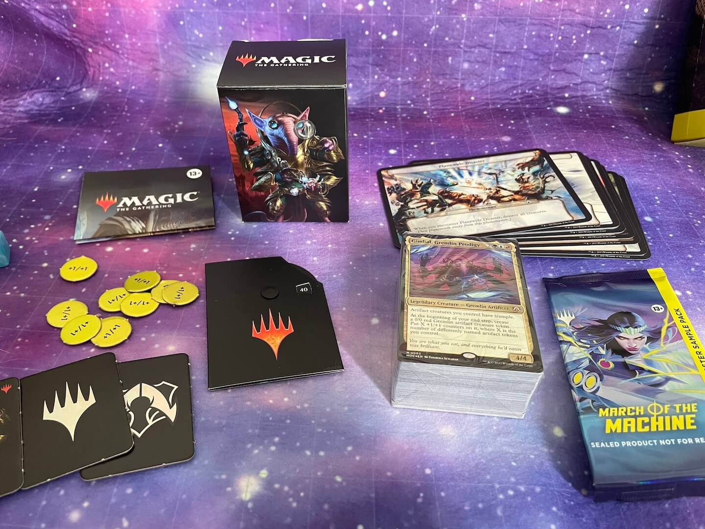 An image of the contents of Tinker Time, a Magic: The Gathering March of the Machine Commander Deck