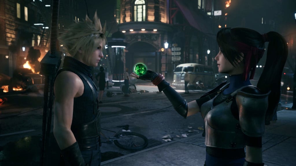 Jessie giving materia to Cloud in the Final Fantasy VII Remake, which leads the March PS Plus lineup