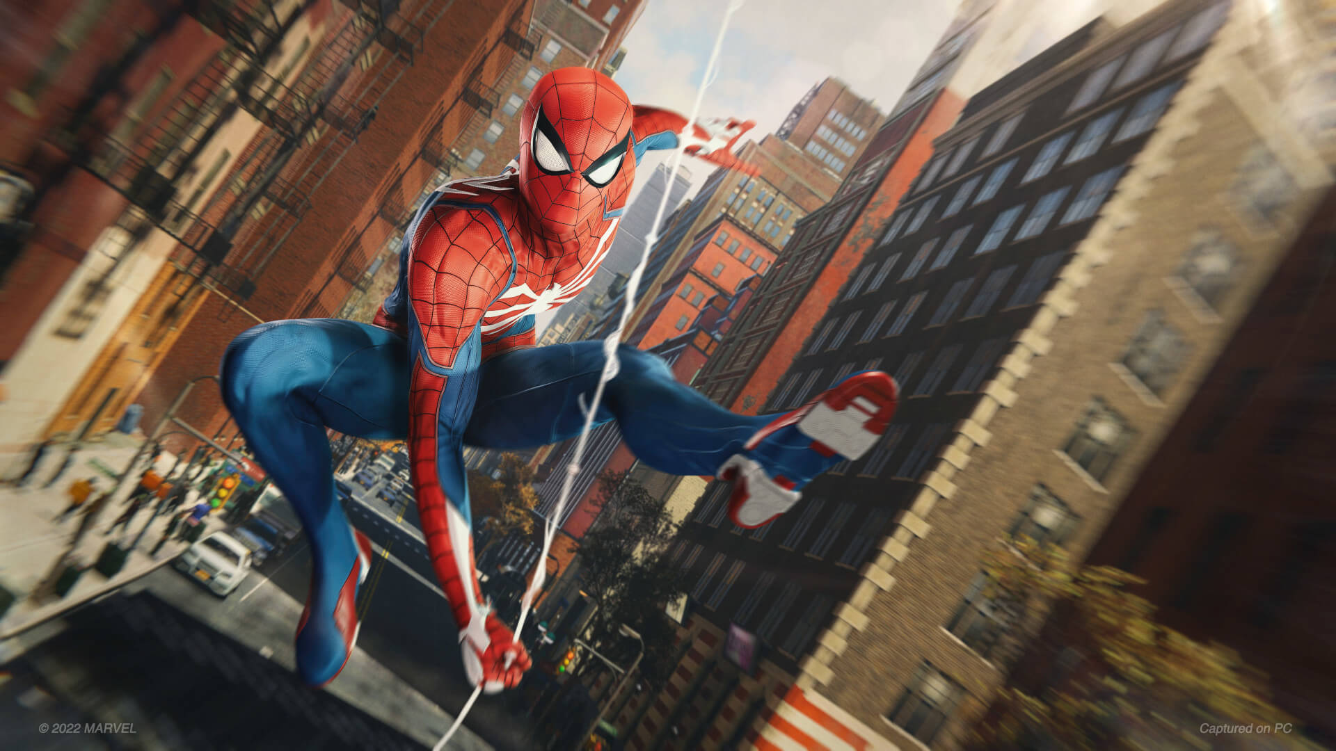 Spider-Man swinging through the city in Marvel's Spider-Man on PC, which sold pretty well according to the August 2022 NPD results