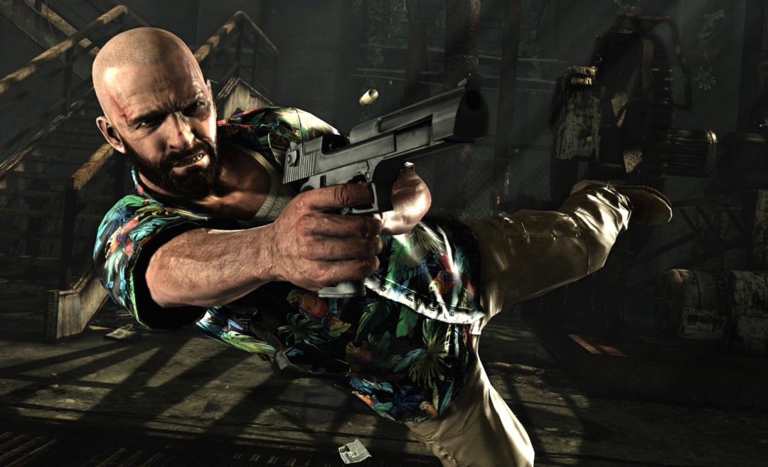 Max Payne with a shaved head leaping through the air with a gun drawn
