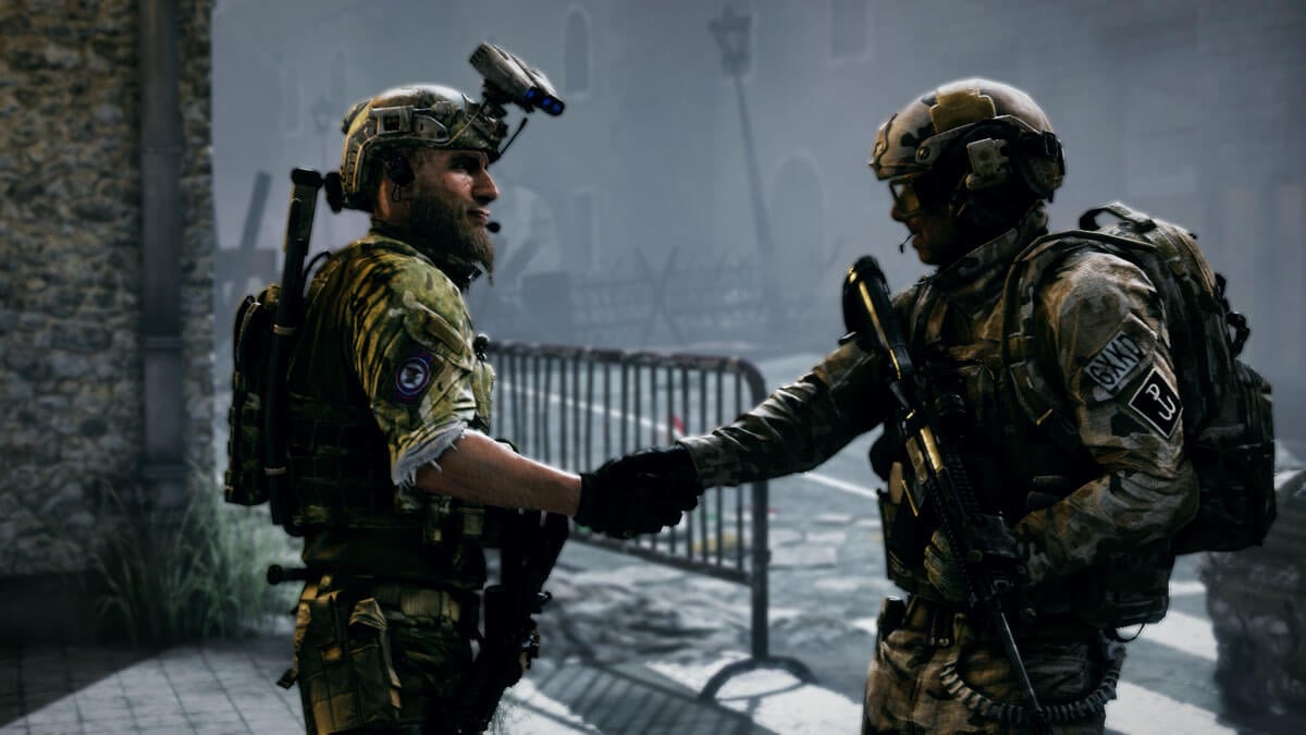 A cutscene of Medal of Honor: Warfighter, showcasing two soldiers greeting each other in an urban warone.
