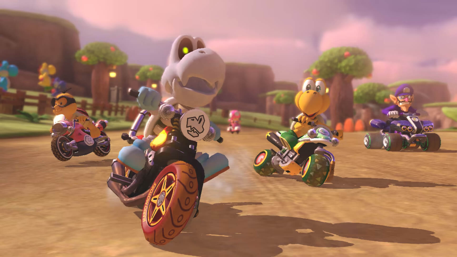 Dry Bones, a Koopa Troopa, Waluigi, and a Lakitu racing in Mario Kart 8 Deluxe, probably present at Nintendo Live 2023