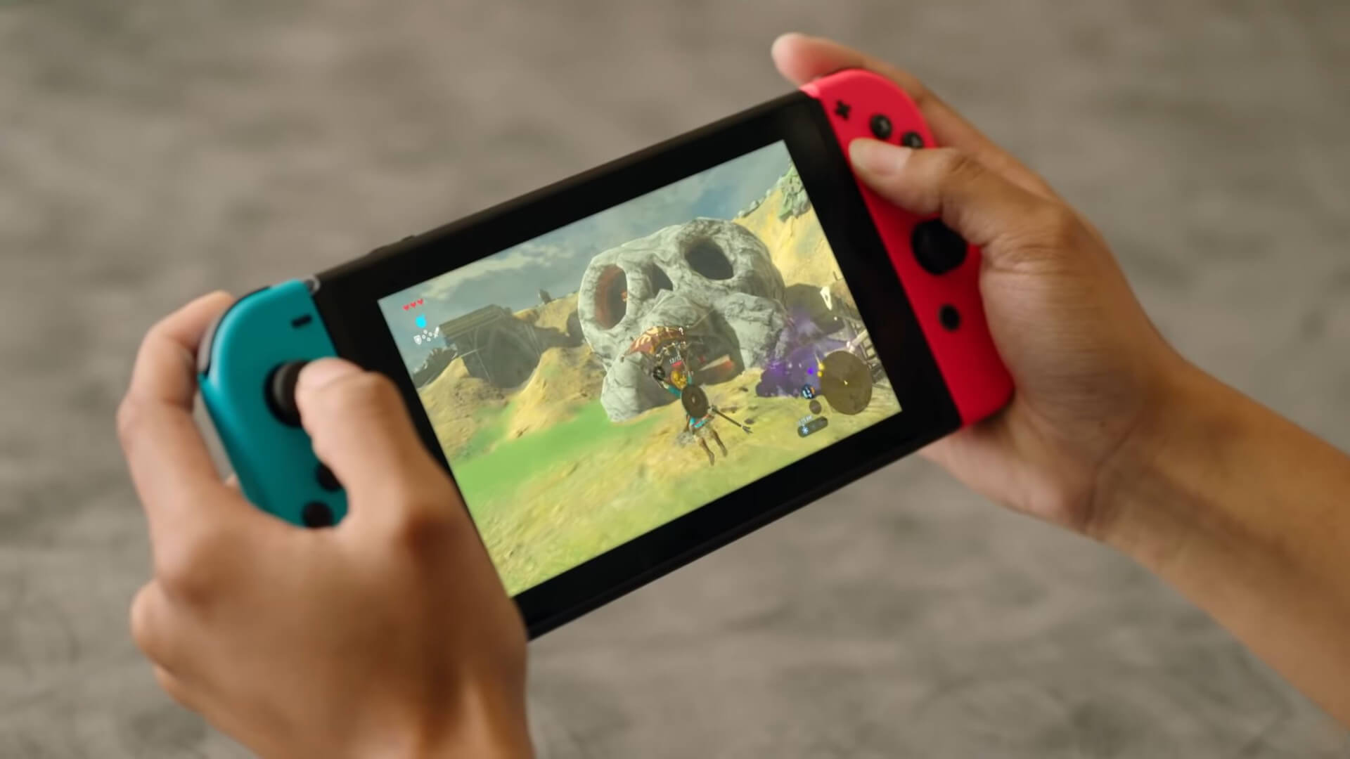 Someone playing Breath of the Wild on a Nintendo Switch