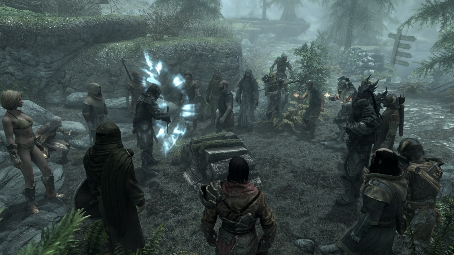 Players gathered around a pile of wood in the Skyrim co-op mod Skyrim Together Reborn