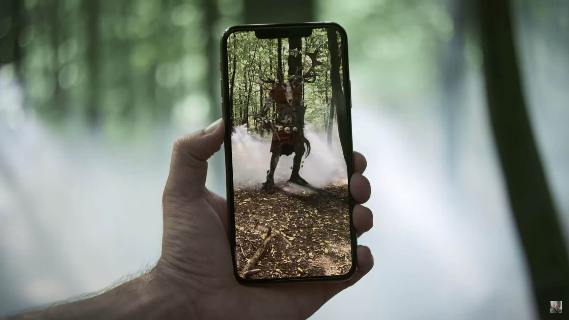 A player holding their phone up to a monster in The Witcher: Monster Slayer