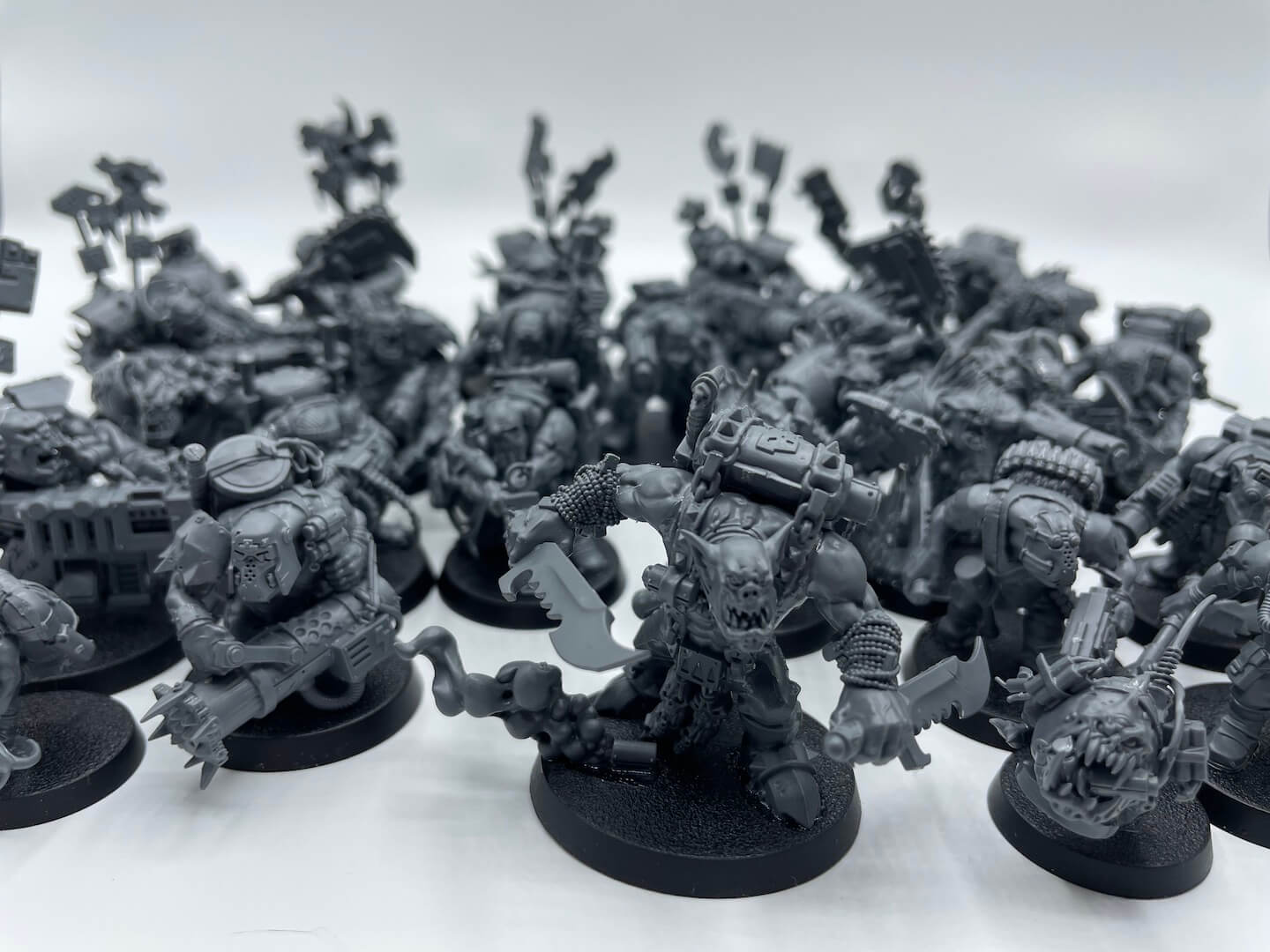 An image of the Warhammer 40K Boarding Patrol Orks included in the box set, a range of wild and screaming Orks