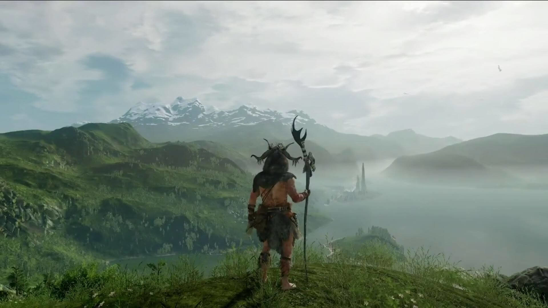 The player's tribesman looking out over a vista in Wild