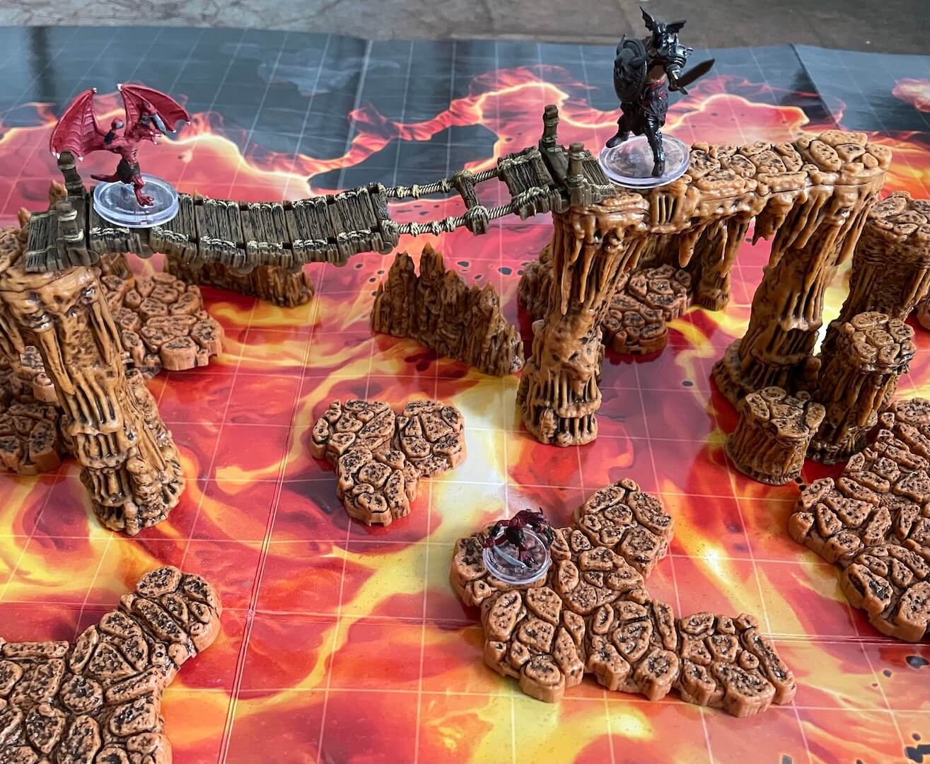 Now we've raised the stakes and upped the height on our battle with an expansion to the Caverns Set of WizKids WarLock Dungeon Tiles.