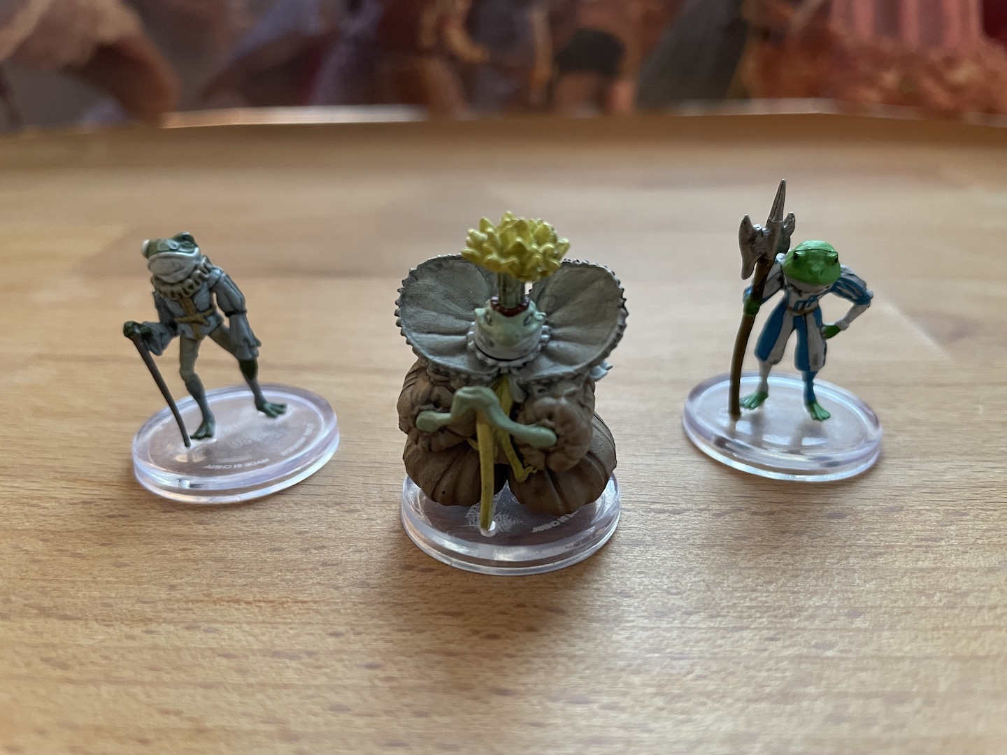 Gullop the XIX and a Bullywug Royal and Bullywug Knight from Wizkids Wild Beyond The Witchlight 
